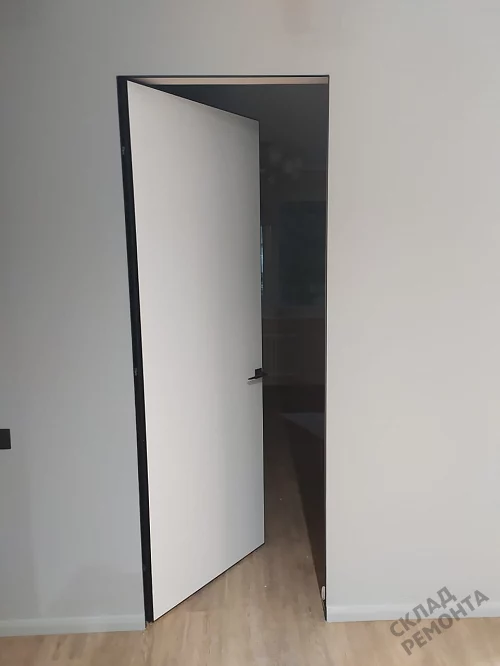 Фото Скрытая дверь AxelDoors Invisible Reverse 2300 обр.откр(алюм.кр черн с 4х), под покраску, без стекла – купить в Чите: цена, описание, фото. Интернет-магазин. 4